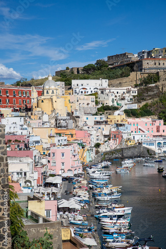 beautiful Procida island with colorful houses in sunny summer day, Italy