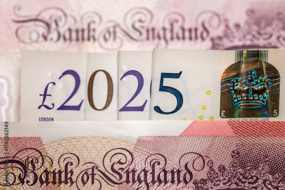 2025 in British pounds. UK banknotes arranged in date 2025, Concept, financial and economic analysis of Great Britain. British money. closeup