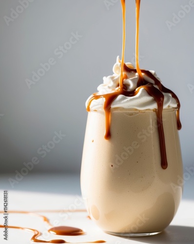 Creamy Banana Smoothie with Caramel Drizzle and Whipped Topping