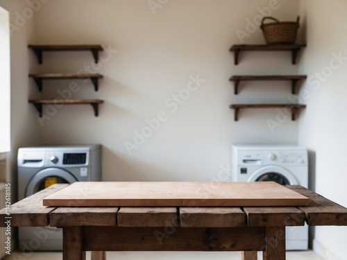 Blank Wooden Board on Table with Washer and Shelves in Background photo