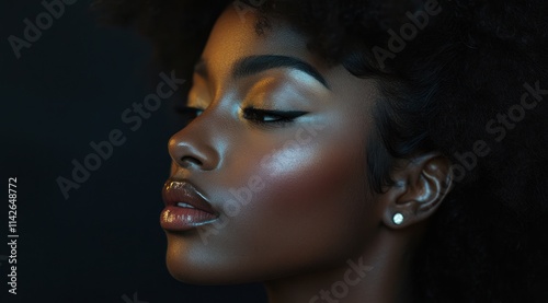 A close-up portrait of a beautiful black woman with long shiny hair and make-up . Haircare, beauty and cosmetics concept.