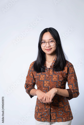Confident Young Woman in Patterned Shirt