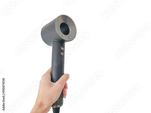Close-up of a hand holding a modern, sleek hair dryer isolated on a transparent background.