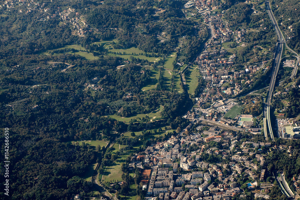 Fototapeta premium Rapallo Village near Genoa Aerial view cityscape from airplane view of golf course