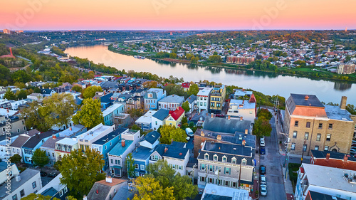 Aerial of Cincinnati at Sunset with River and Historic Homes