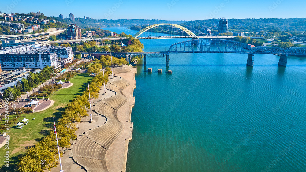 Fototapeta premium Aerial of Cincinnati Bridges Over Ohio River and Riverside Park