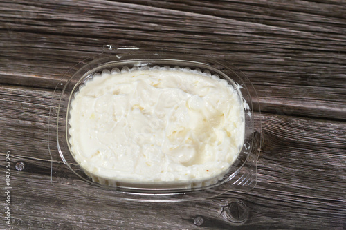 Garlic sauce or Tomeya, Tomiya, on the traditional middle eastern dip way, Garlic sauce is a sauce prepared using garlic as a primary ingredient, emulsion, such as oil, butter or mayonnaise, yoghurt photo