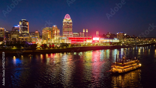 Fotografie Aerial Cincinnati Night Skyline with Riverboat and Ballpark