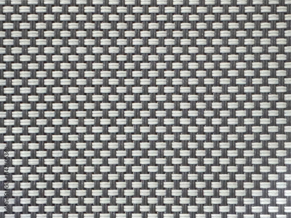 Close up photo of grey and white woven bamboo rattan texture. Wicker art or bamboo rattan weaving grey color in small checkerboard pattern. Seamless background texture. Close up photo of grey and white woven bamboo rattan texture. Wicker art or bamboo rattan weaving grey color in small checkerboard pattern. Seamless background texture.