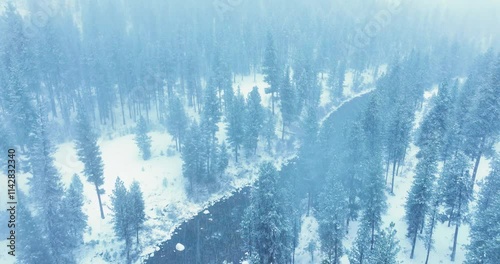 Drone Flight Over Payette River During Heavy Snowstorm