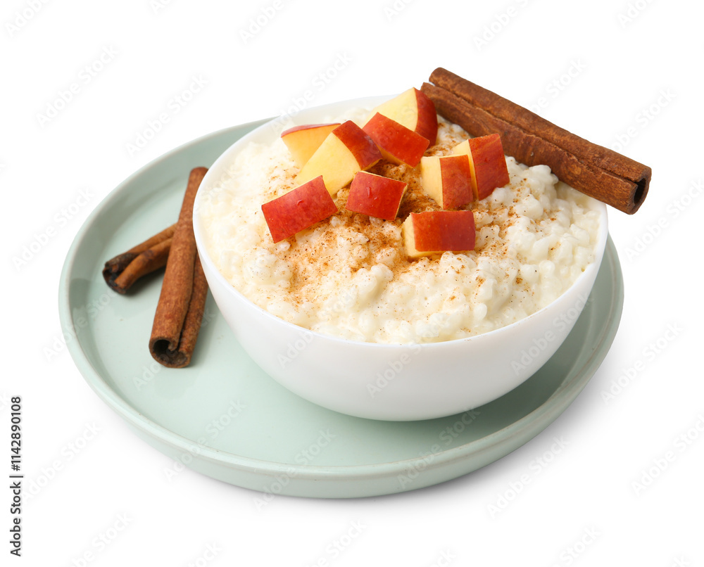 Delicious rice pudding with apples and cinnamon isolated on white Delicious rice pudding with apples and cinnamon isolated on white