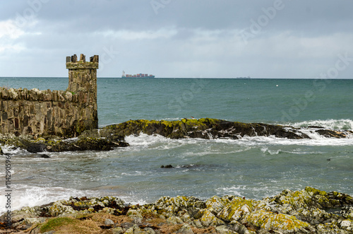 Waves crashing over the rocks at Groomsport Co. Down Northern Ireland