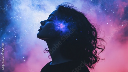 Woman's profile silhouetted against a vibrant nebula, cosmic energy emanating from her head.