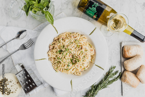Italian pasta accompanied by wine. Top view