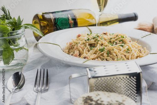 Italian pasta accompanied by wine. Close up