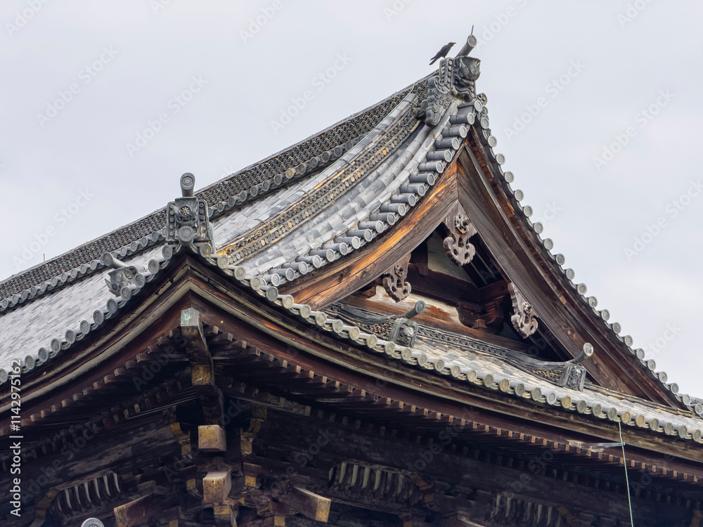 Naklejka premium Niomon Gate of Ninna Ji Temple. This temple is a Shingon Buddhist temple in historic city of Kyoto, Japan. Ninna Ji belongs to Ancient Kyoto UNESCO World Heritage Site.