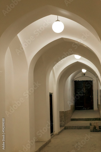 Shadows and lights of the columns of the grand mosque in Yazd, Iran with impeccable details.	 photo