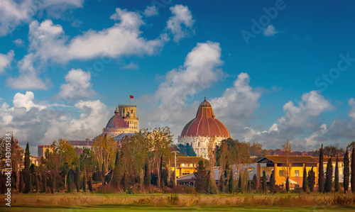 Distant view of old city of Pisa from the mediterrean coast, illustrating how much the coastline has moved away living the ancient maritime city without a sea port, Tuscany, Italy photo