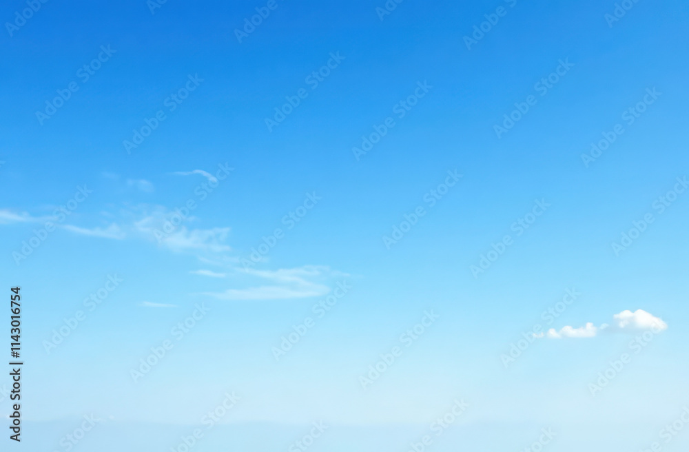 The sky is blue and clear, with clouds. The sky is blue and clear, with clouds.