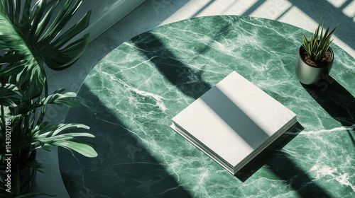 Blank magazine mockup on a green marble stone coffee table with a shadow overlay.