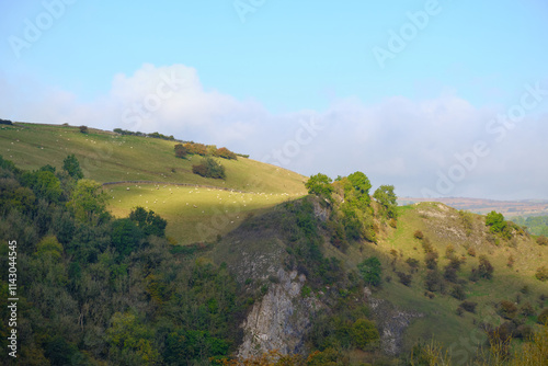 Distant hill and cliff on a sunny day photo