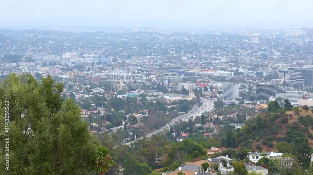 Stunning panoramic view showcasing Los Angeles skyline and urban landscape from Runyon Canyon Park. Stunning panoramic view showcasing Los Angeles skyline and urban landscape from Runyon Canyon Park.