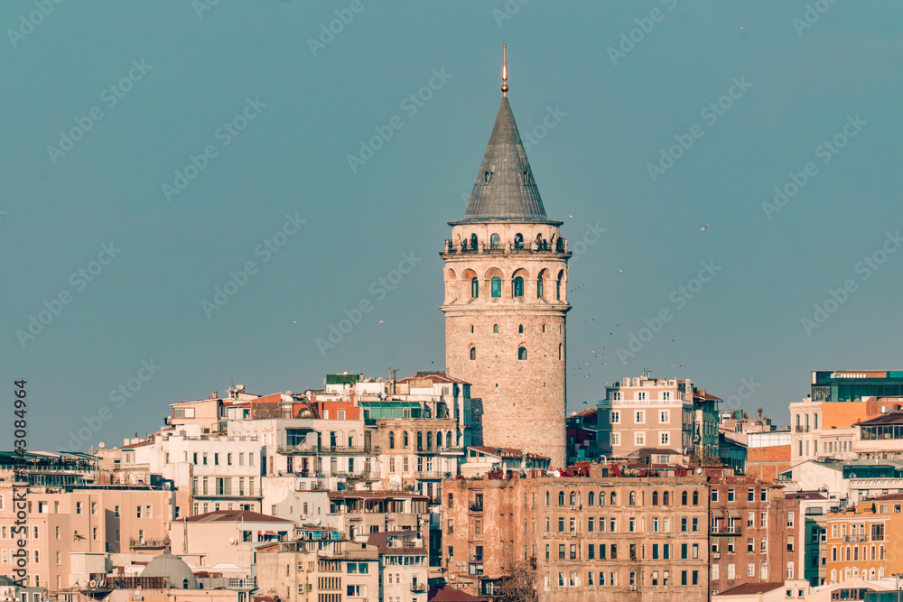The historic Galata Tower stands tall in Istanbul. Surrounded by vibrant buildings, it symbolizes the city’s rich history and charm. The historic Galata Tower stands tall in Istanbul. Surrounded by vibrant buildings, it symbolizes the city’s rich history and charm.
