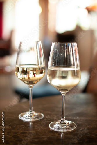 Two glasses of cold white wine