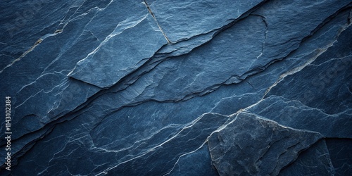 Dark blue slate rock texture background with rough and cracked stone layers, creating a natural, rough surface. Abstract design.