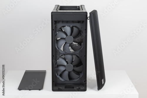 Front view of empty  big tower, PC case, chassis, removable top panel with dust filter and 15.5 mm front panel grille with 45% porosity, two extra-thick 200 x 38 mm front fans for maximum air intake photo