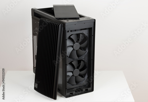 Side view of empty  big tower, PC case, chassis, removable top panel with dust filter and 15.5 mm front panel grille with 45% porosity, two extra-thick 200 x 38 mm front fans.