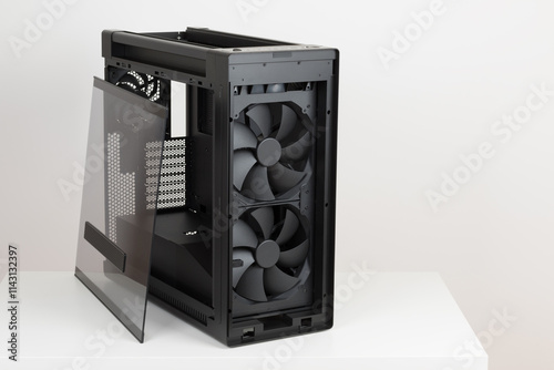 Side view of empty  big tower, PC case, chassis, removable tempered-glass left panel, two extra-thick 200 x 38 mm front fans for maximum air intake