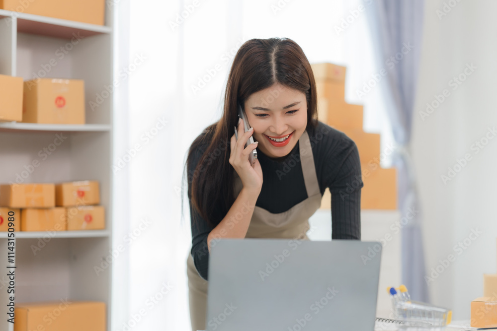 Smiling Businesswoman on Phone, Managing Online Orders Smiling Businesswoman on Phone, Managing Online Orders