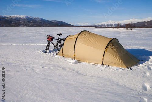 camping on a frozen lake in sweden