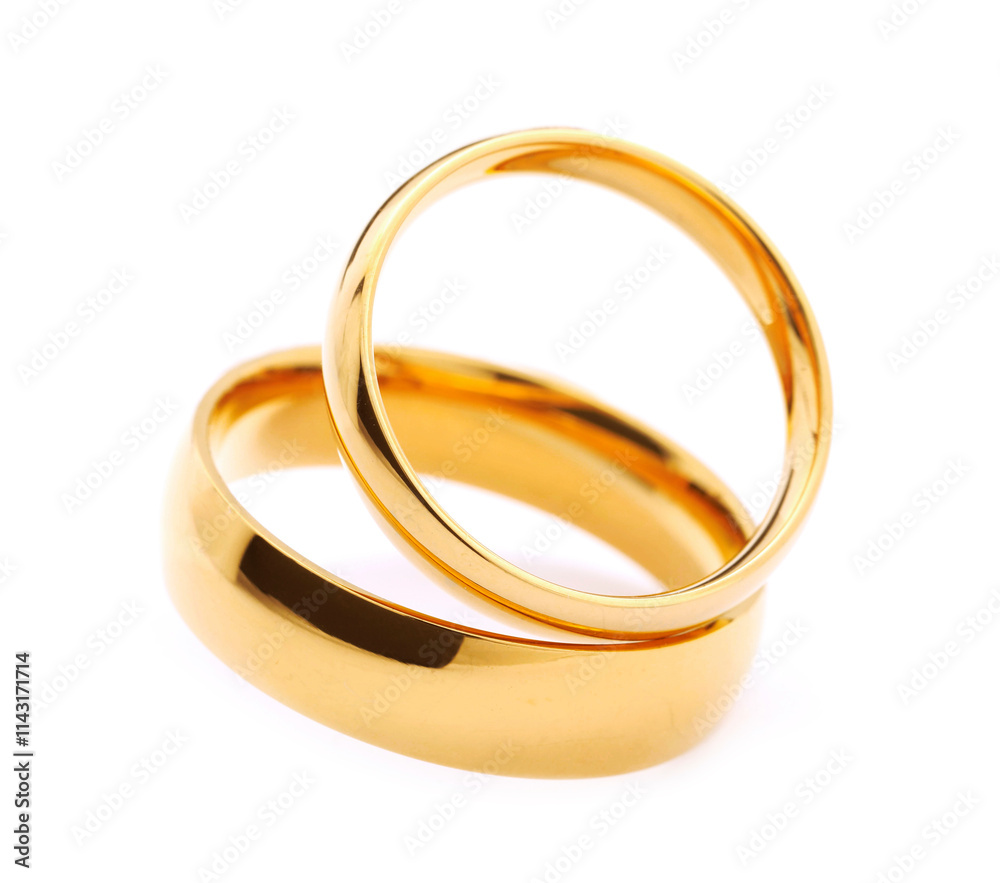 Beautiful golden wedding rings isolated on white Beautiful golden wedding rings isolated on white