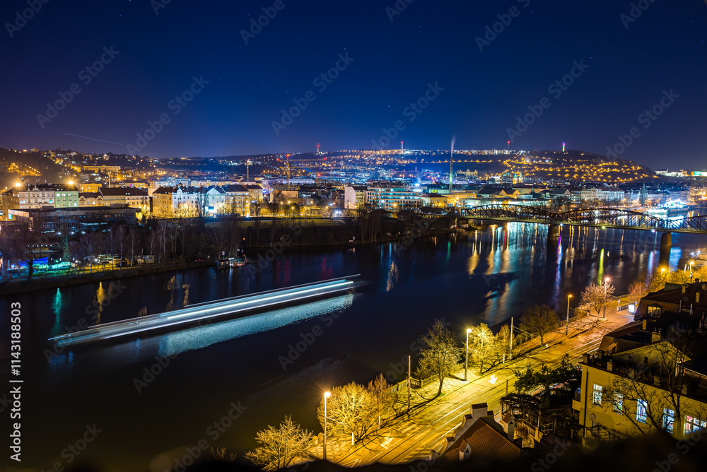 Fototapeta premium Prague, Czech republic - February 23, 2022. Night panorama of Vysehrad towards to Smichov and Cisarska louka area
