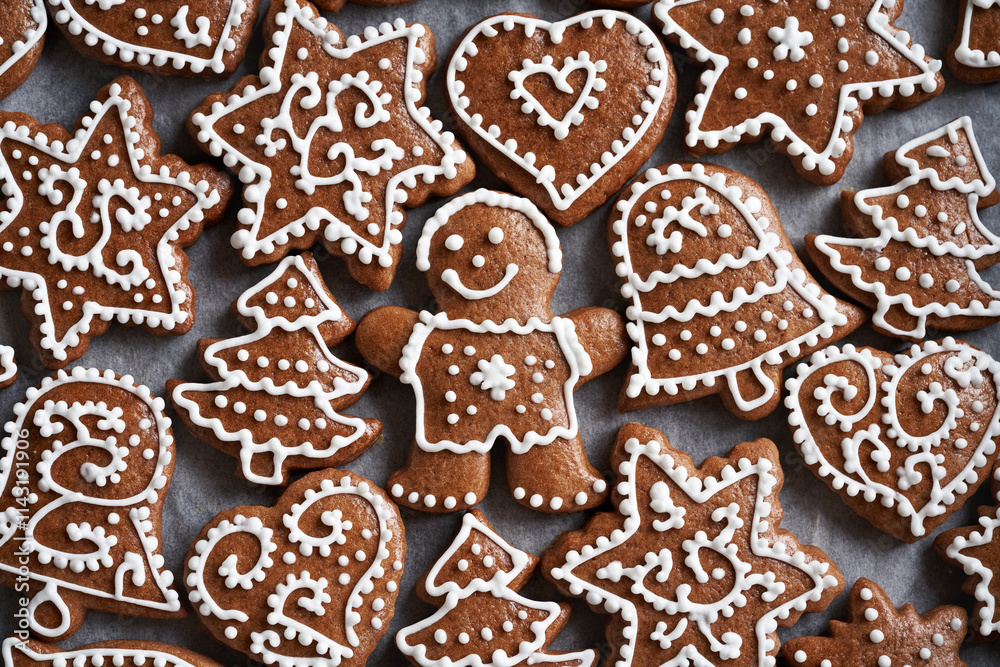 Homemade gingerbread Christmas cookie decorated with white icing, top view Homemade gingerbread Christmas cookie decorated with white icing, top view
