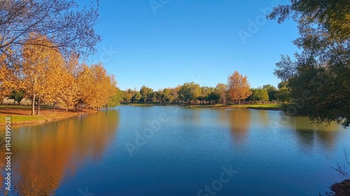 serene autumn landscape with vibrant fall foliage reflections in calm pond water