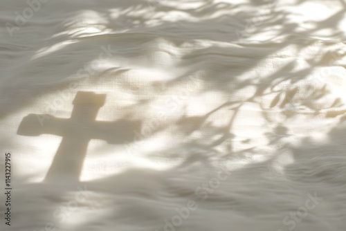 Cross shadow on linen cloth photo