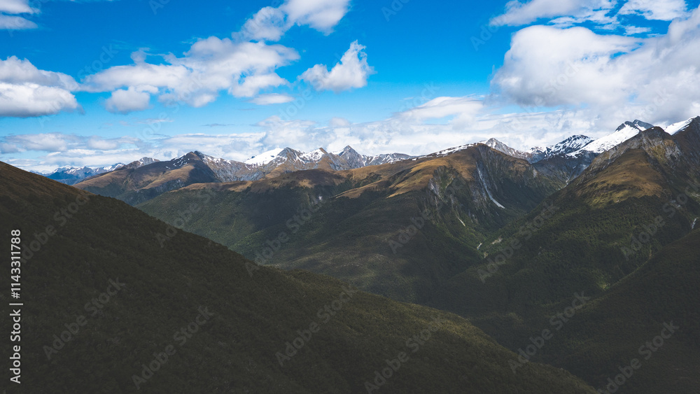 Beautiful mountainous landscape blue sky mount aspiring west coast new zealand brewster track hiking views scenery Beautiful mountainous landscape blue sky mount aspiring west coast new zealand brewster track hiking views scenery
