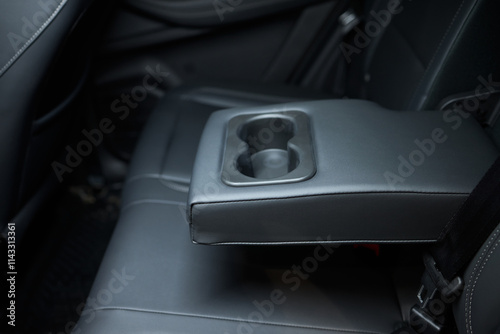 Vehicle armrest with cup holder, beige design, for luxury cars
