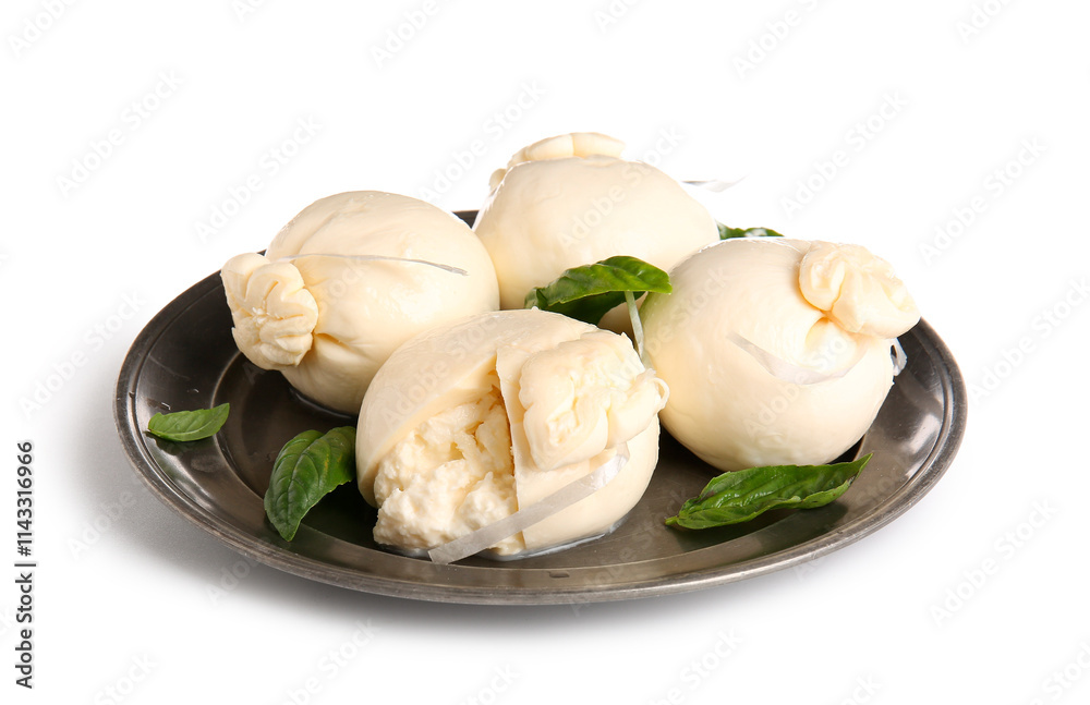 Plate of tasty Burrata cheese with basil on white background