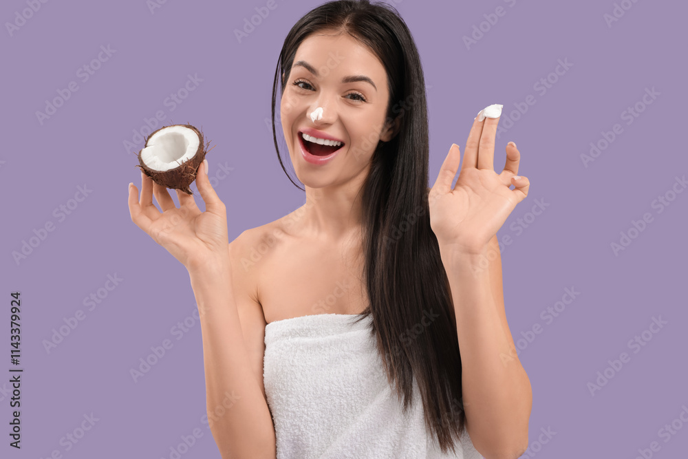 Beautiful young happy woman with coconut and cream on purple background Beautiful young happy woman with coconut and cream on purple background