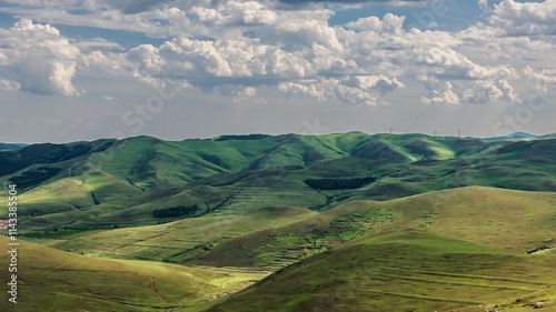 Vibrant summer landscape showcasing the rolling hills of Daqingshan in Inner Mongolia photo