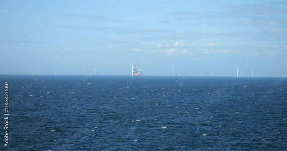 An offshore wind farm in the North Sea near Amsterdam An offshore wind farm in the North Sea near Amsterdam