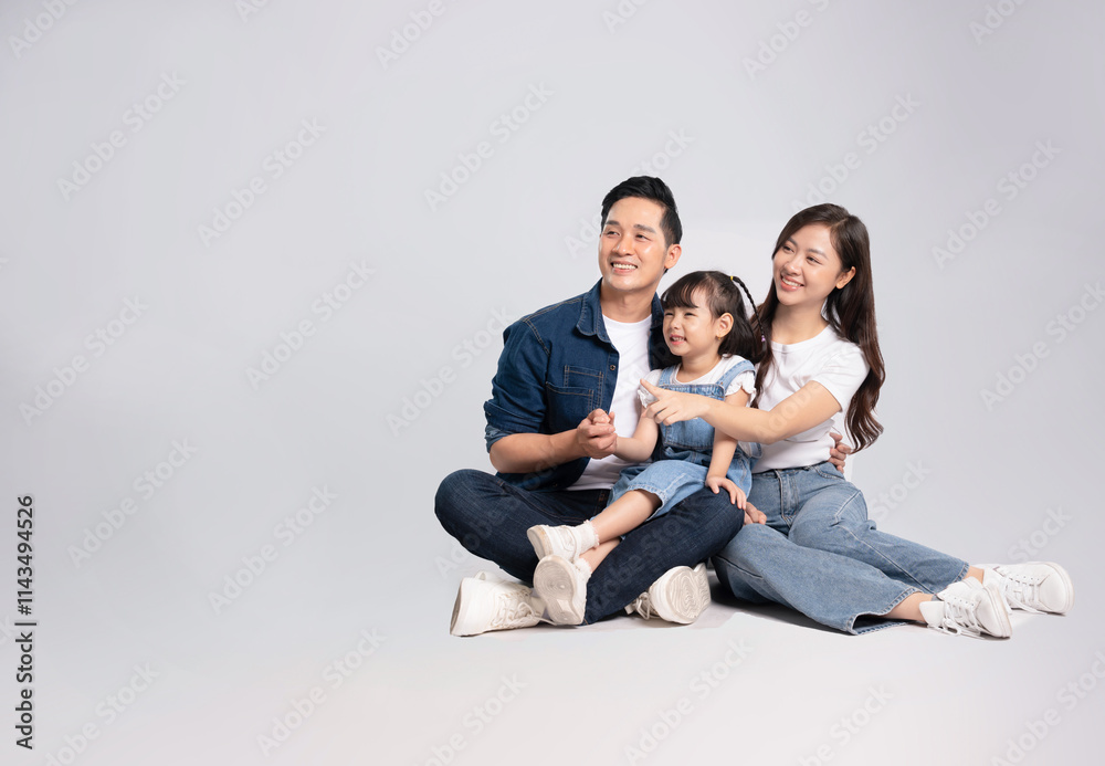 Imagefull body of a happy asian family posing on a white background Imagefull body of a happy asian family posing on a white background