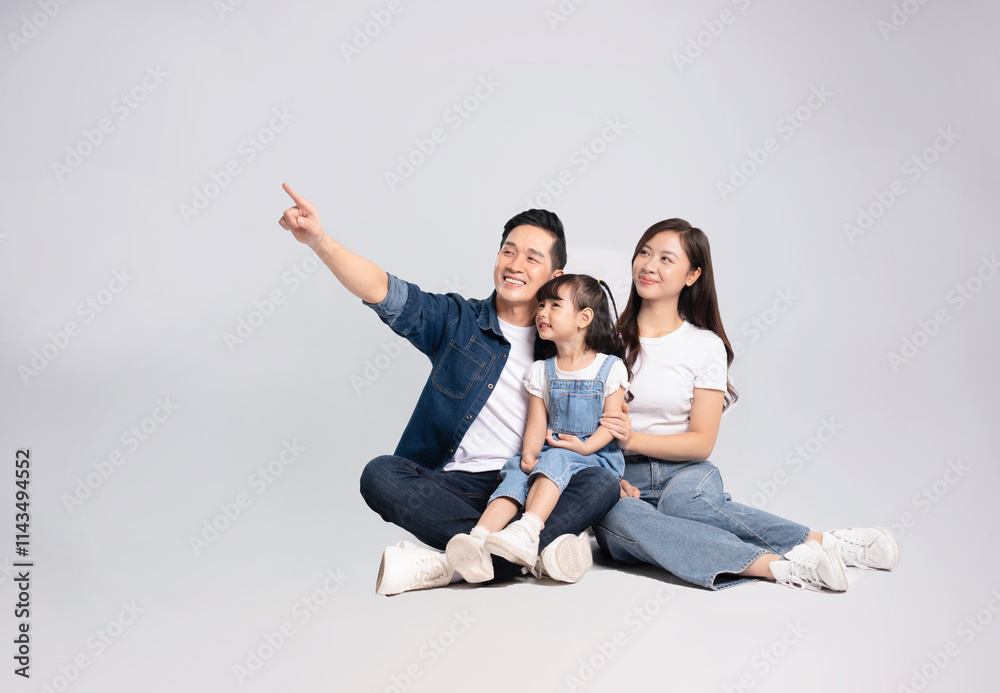 Imagefull body of a happy asian family posing on a white background Imagefull body of a happy asian family posing on a white background