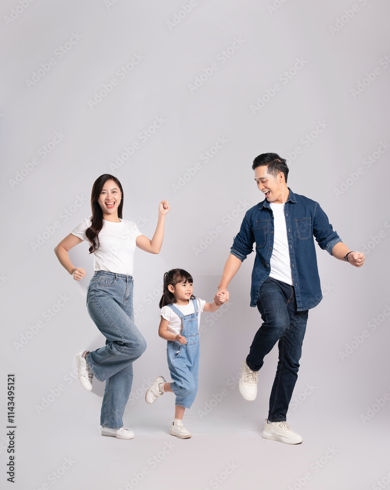 full body of a happy asian family posing on a white background full body of a happy asian family posing on a white background