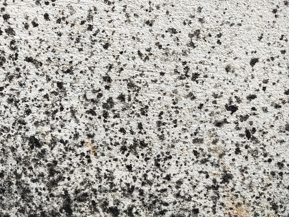The cement surface has stains. The cement surface has stains.