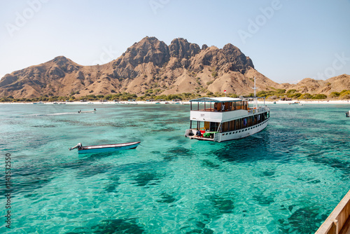 Small boat attached to main boat